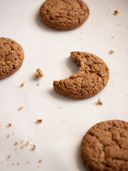 Oatmeal cookies on white plate in morning light