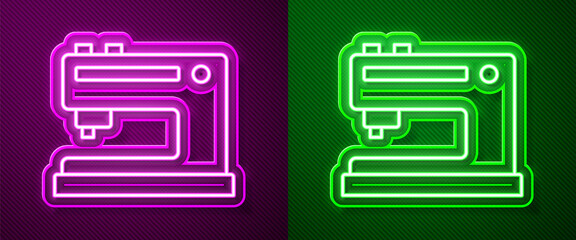 Glowing neon line Sewing machine icon isolated on purple and green background. Vector Illustration.