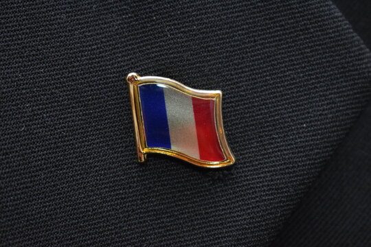 France Flag Lapel Pin On A Suit