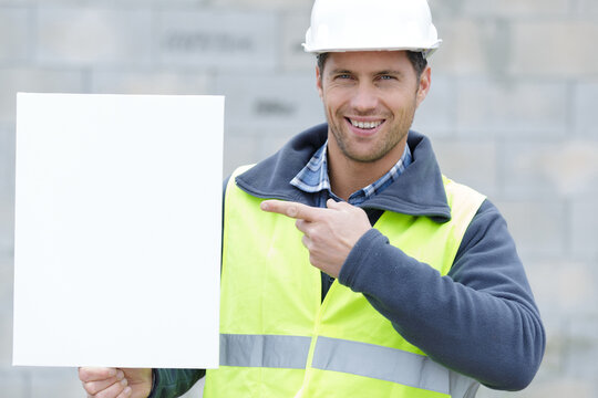 Builder - Construction Worker Showinga Banner