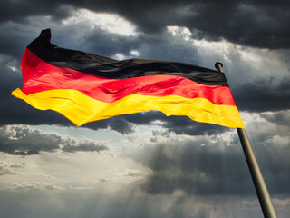 Flag of the Federal Republic of Germany on the flagpole