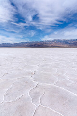 Badwater Basin salt flats and desert landscape in Death Valley National Park, California.