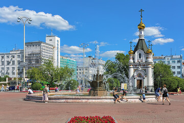 Square of Labor in Yekaterinburg, Russia, with the Stone Flower Fountain and Chapel of St. Catherine. - 392484435