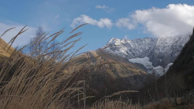 clouds float over a glacier in the Caucasus mountains in Sochi