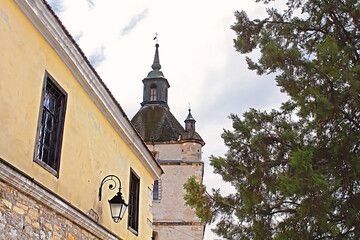 Fototapeta na wymiar Bell Tower of the Armenian church in Kamianets-Podilskyi, Western Ukraine