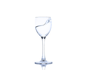 A splash of  water in a glass for wine. Water splashes. 