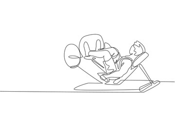 Single continuous line drawing of young sportive man training with leg press in sport gymnasium club center. Fitness stretching concept. Trendy one line draw design vector graphic illustration