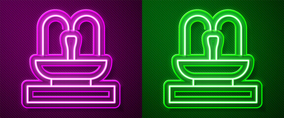 Glowing neon line Fountain icon isolated on purple and green background. Vector.