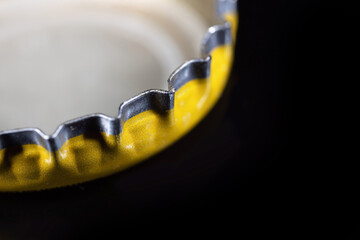 Close up reverse of a metal crown cap with copy space. Selective focus