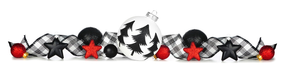 Christmas border of ornaments and black and white checked buffalo plaid ribbon isolated on a white...