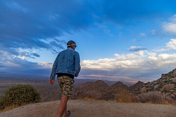 Man Hiking Up Toms Thumb Trail In Scottsdale, AZ