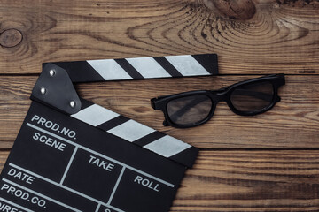 Retro cameras with 3d glasses on wooden background. Top view
