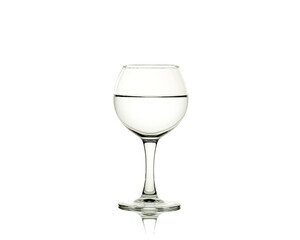 Liquid in a wine glass isolated on white background