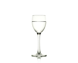 Liquid in a wine glass isolated on white background