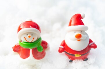 Santa claus and snowman on snow happy Christmas and happy new year day