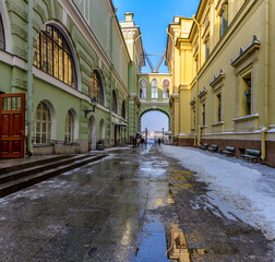 Fototapeta na wymiar Passage from Millionnaya Street to the Palace Embankment past the Small Hermitage.