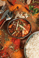 Assortment of various kinds of Indian cousine Indian Food on Wooden rusty table