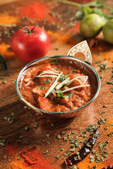 Assortment of various kinds of Indian cousine Indian Food on Wooden rusty table