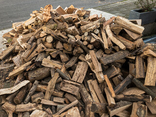 Firewood in the courtyard of a house.