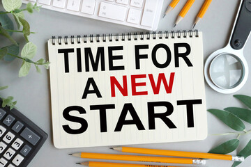 TIME FOR NEW START, text on NOTEBOOK with GRAY background