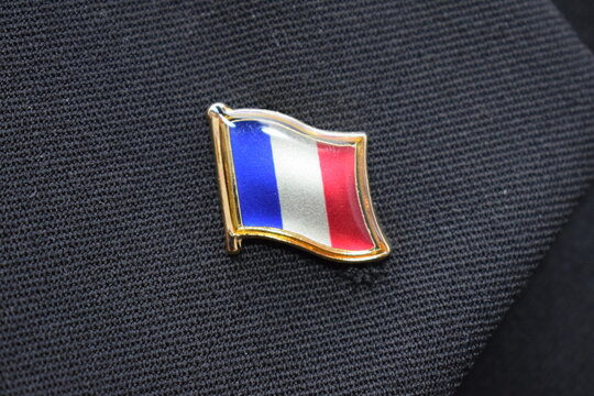 France Flag Lapel Pin On A Suit