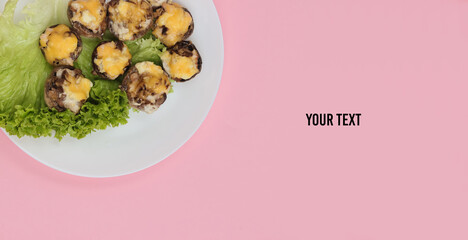 Stuffed Mushroom Cheese. Restaurant Dish on pink background with space for text
