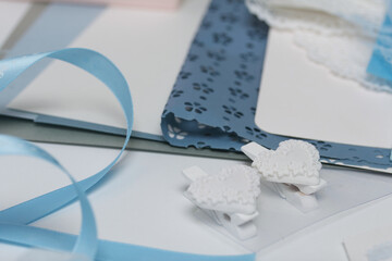 Making greeting cards. Handicraft accessories on the white surface of the table. Dried flowers and...