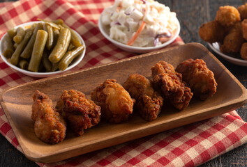 Breaded and Fried Oysters on a Rustic Wooden Table
