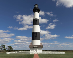 Bodie Island Lighthouse near Nags Head, NC in the Outer Banks of North Carolina with beautiful blue...