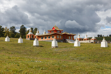 Fototapeta na wymiar buddhist monastery in mongolia, Stupas along the wall of a monaster. Bornuur