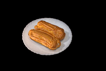 cream cake on a dark background