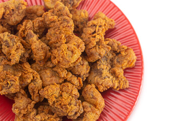 Fried and Crispy Chicken Gizzards on a White Background