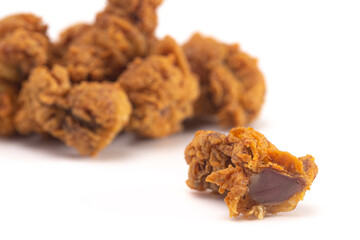 Fried and Crispy Chicken Gizzards on a White Background