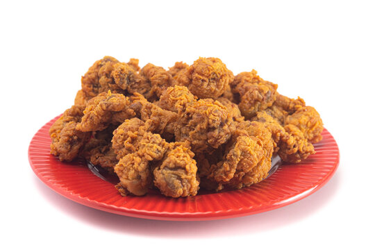 Fried and Crispy Chicken Gizzards on a White Background