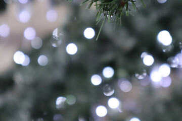 Christmas decorations - multicolored garlands. Selective soft focus. Snowflake from New Year's lanterns.