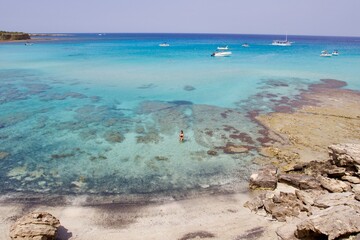 Fototapeta na wymiar Panoramic view of the amazing turquoise and clear sea water of blue lagoon in Cyprus 