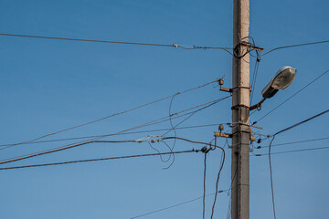 Lighting pole with lamp and wires