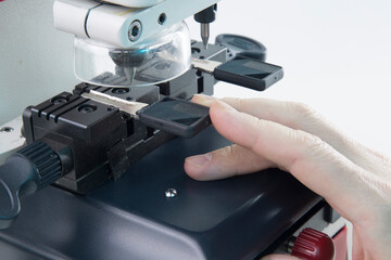 Production of home keys on a specialized vertical key machine.