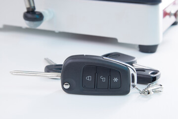 Production of car keys on a specialized key machine.
