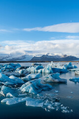 Amazing iceberg formations at Jokulsalron glacier lagoon landscape of Iceland, frozen land showing the climate changes - 392506863