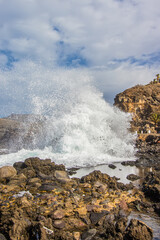 waves in a blue and green ocean near the coast