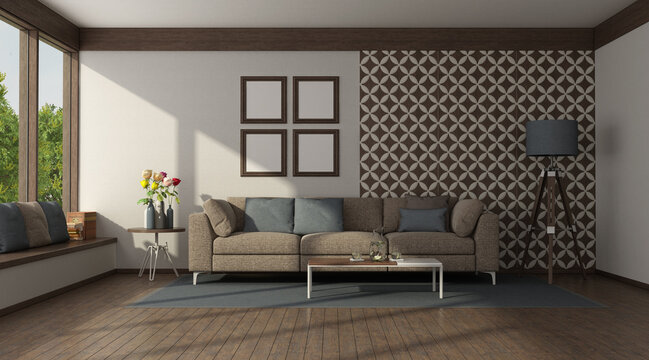 Modern sofa sofa in front of a wall with tiles