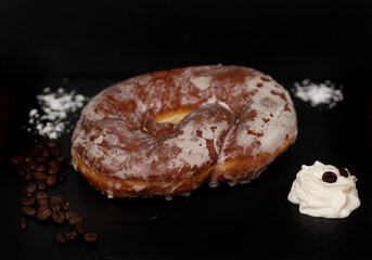 Glazed doughnut and whipped cream