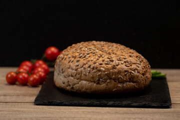 Sunflower seeds bread with fresh cherry tomatoes