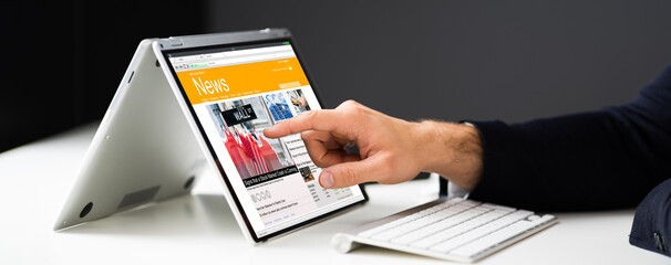 Read Online News Media On Laptop