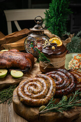 Delicious Roast Christmas duck with apples, homemade sausage, salad and Christmas cake
