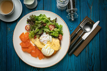 English breakfast, toast, poached egg, sauce, salmon
