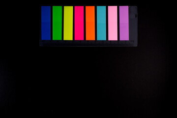 colored stripes on a dark background