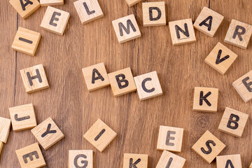 Alphabets on wooden cubes as a background