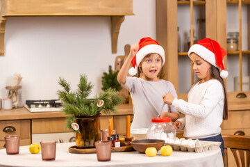 kids baking christmas cookies before the celebration of Christmas. Family
